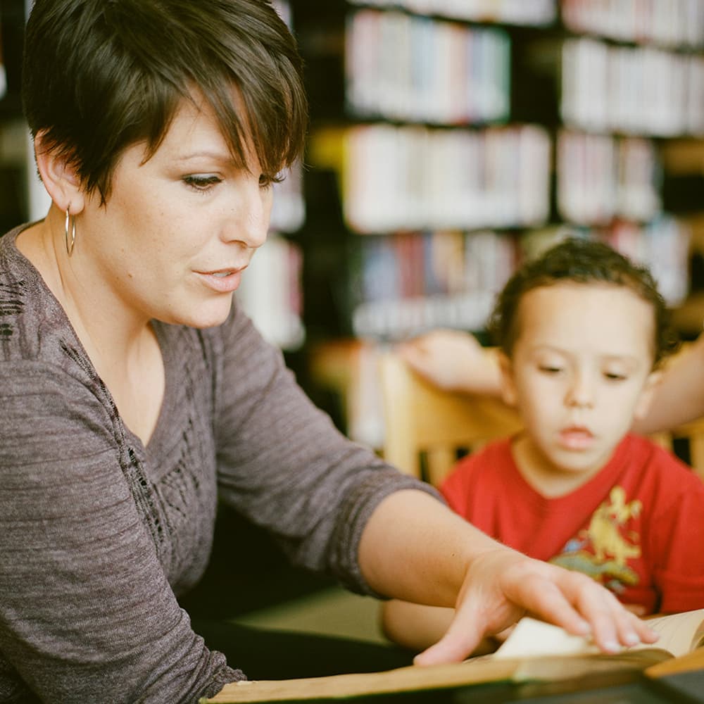 adam-winger-UFG04g43hqs-unsplash copy Teacher and student