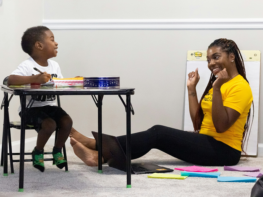 natasha-hall-9rBmRhysF9Y-unsplash Mon teaching son