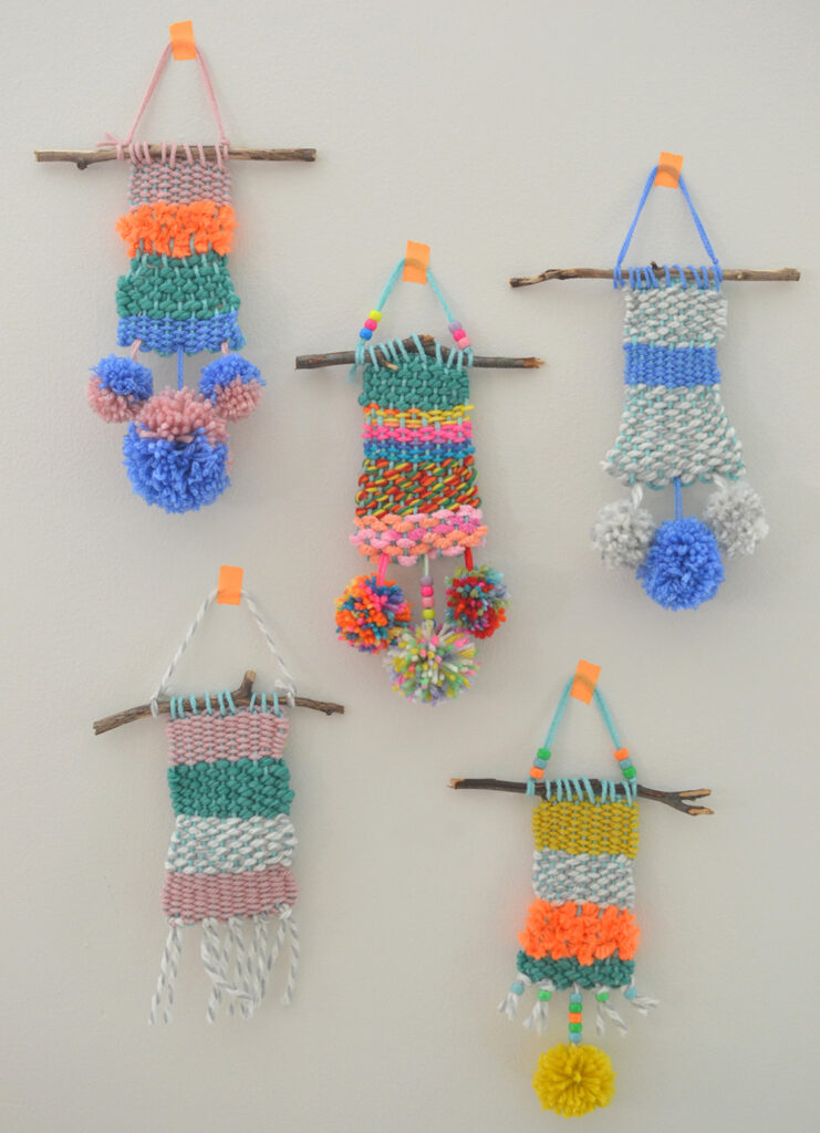 Weaving with kids using a cardboard loom.