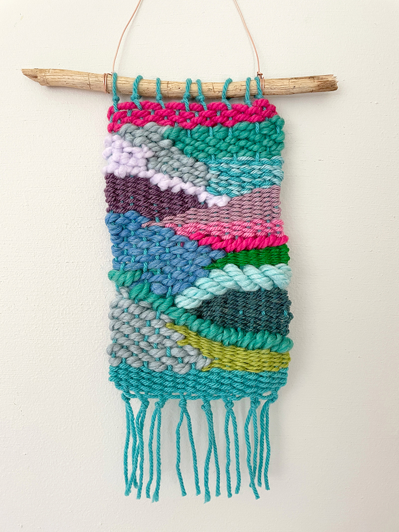 Doodle weaving on a cardboard loom