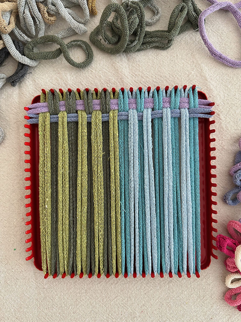 When weaving a potholder on a loom, start with and over/under technique, then alternate with each new loop.