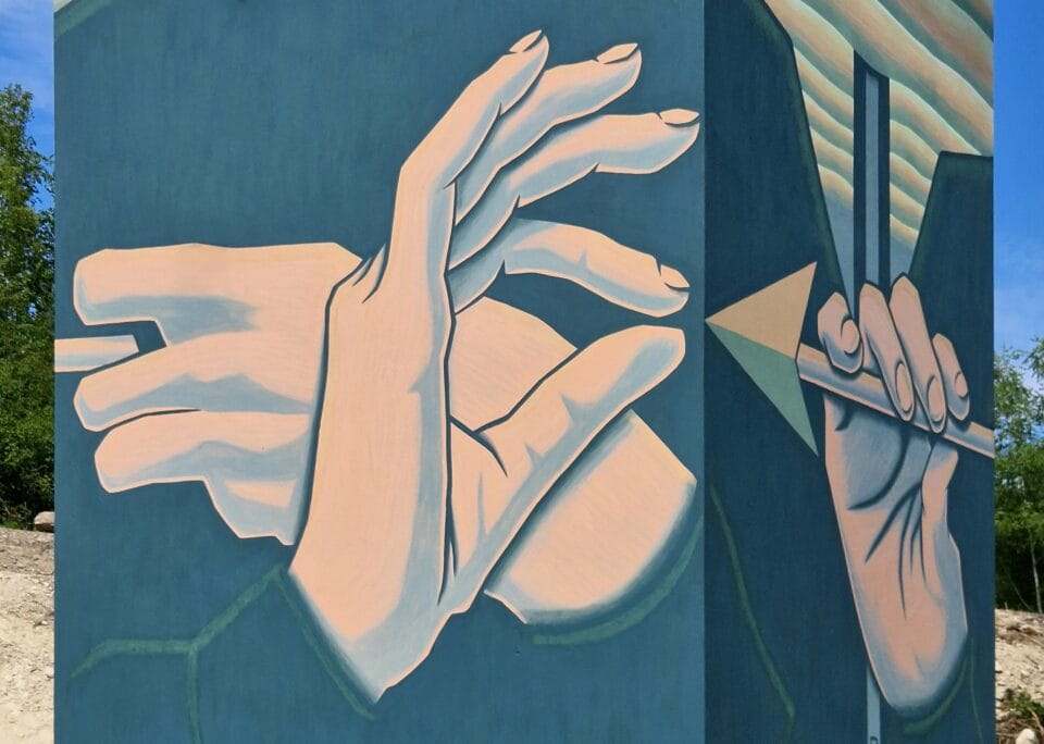 detail of hands on a mural